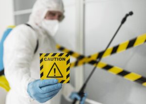 medium shot blurry man holding caution sign - DomiDocs