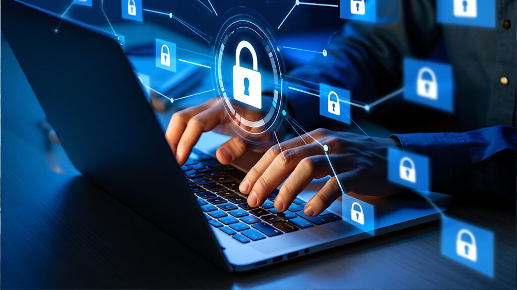 Hands typing on laptop with security icons How to Prevent Home Title Theft